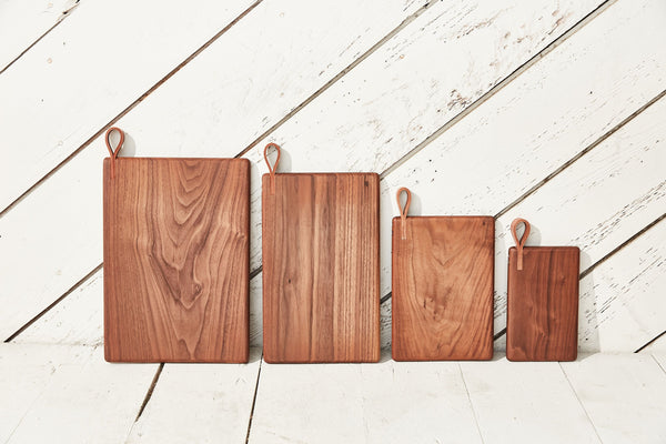 walnut cutting boards with leather straps