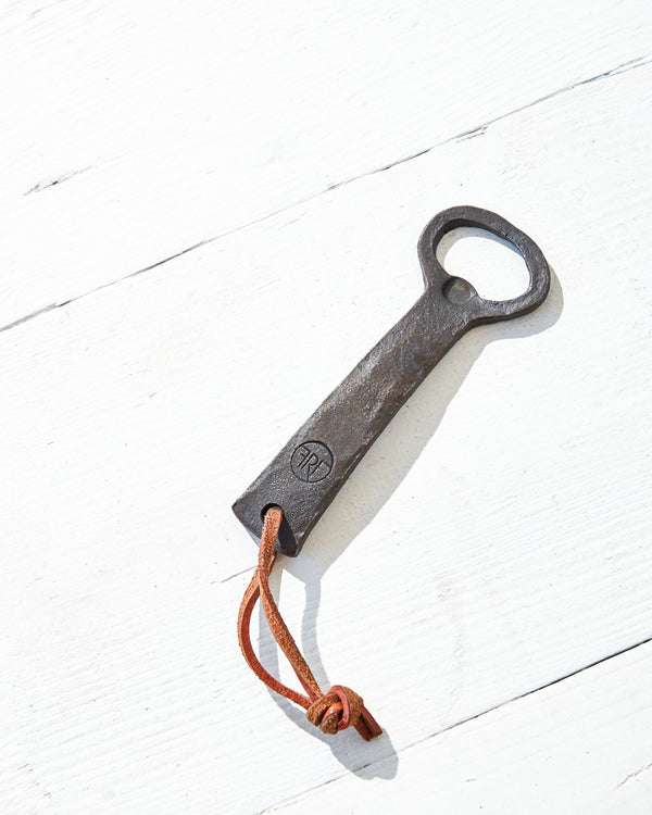 metal bottle opener with leather strap