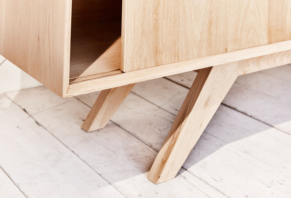 credenza with angled wood base