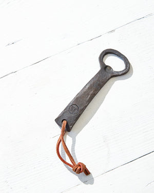metal bottle opener with leather strap