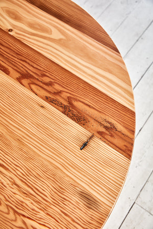 reclaimed wood table with round top