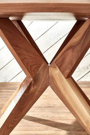 wood table with modern base