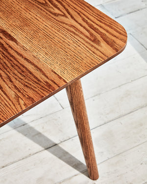 walnut table with round corners