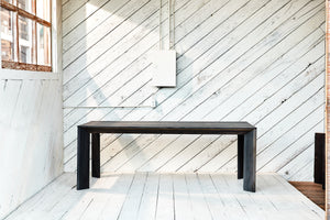 wood table with angular base