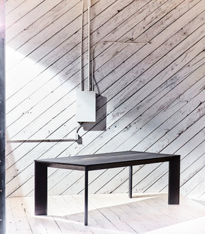 wood table with facet base