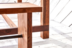 wood dining table with 4-post beam legs