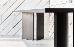 modern wood table with angled base