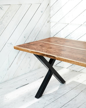 solid wood table with metal base
