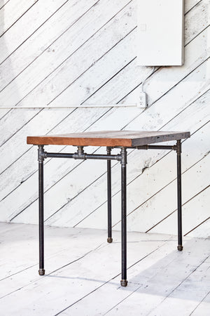 desk with industrial metal base