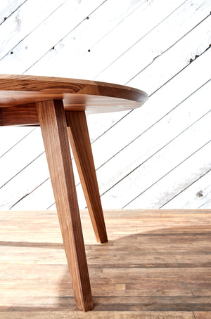 round wood table with undercut edge