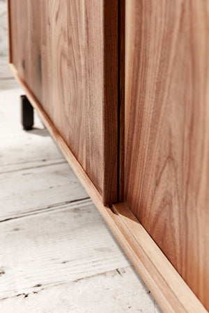 sliding doors on modern credenza