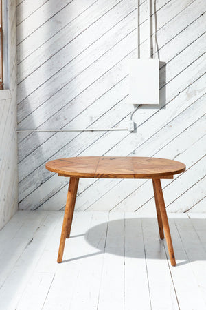 herringbone table with wood legs