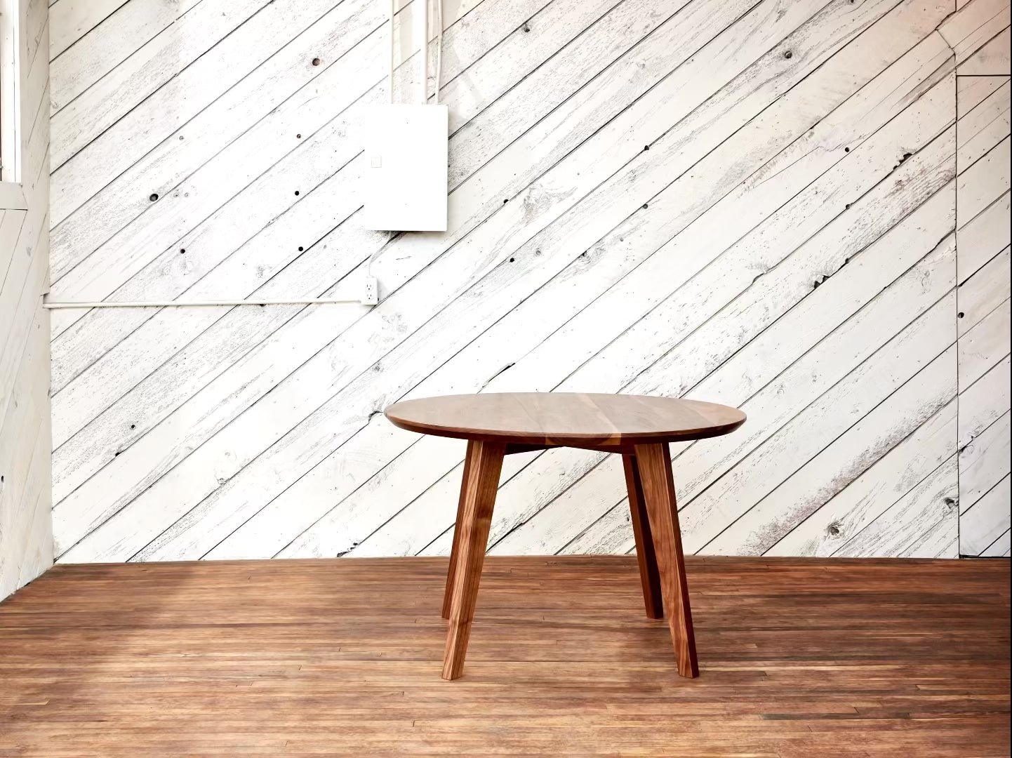 round dining table with undercut edge and 1/2" flat nose