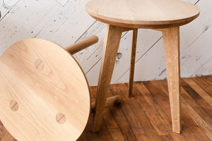 side table with wedge legs and natural wood grain